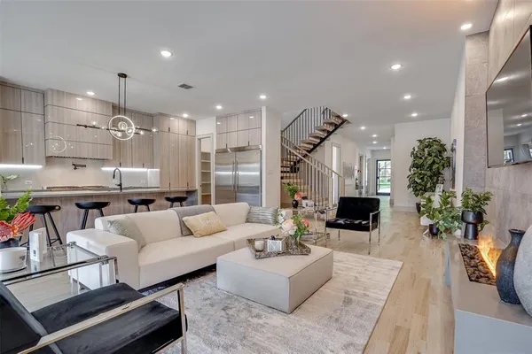 a living room with furniture or couch and a flat screen tv