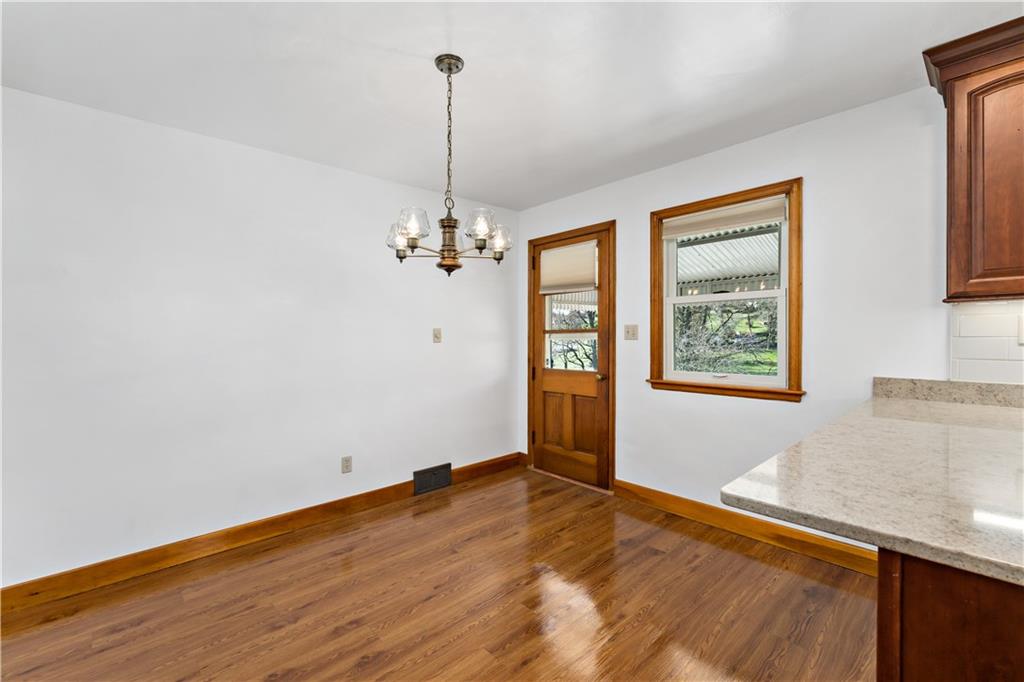 220 McClelland Road Canonsburg, PA 15317 - Photo 11 of 38 a view of empty room with window and wooden floor