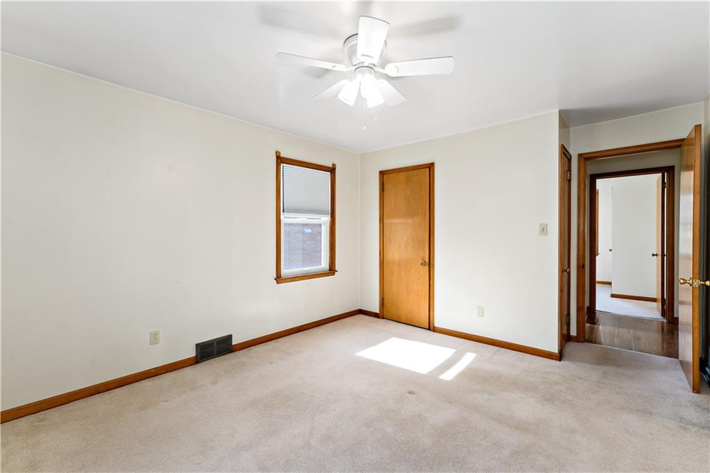 220 McClelland Road Canonsburg, PA 15317 - Photo 13 of 38 an empty room with windows and ceiling fan