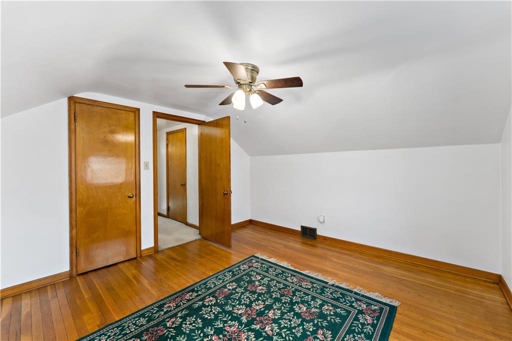 220 McClelland Road Canonsburg, PA 15317 - Photo 18 of 38 a view of room with hardwood floor and a ceiling fan