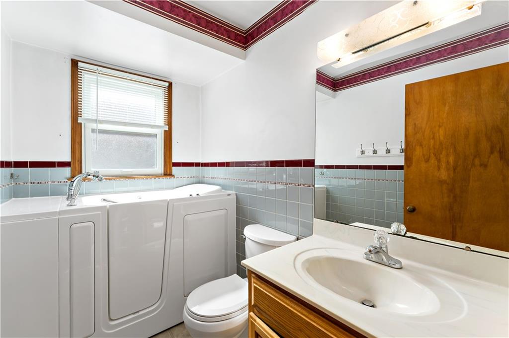 220 McClelland Road Canonsburg, PA 15317 - Photo 19 of 38 a bathroom with a sink toilet and shower