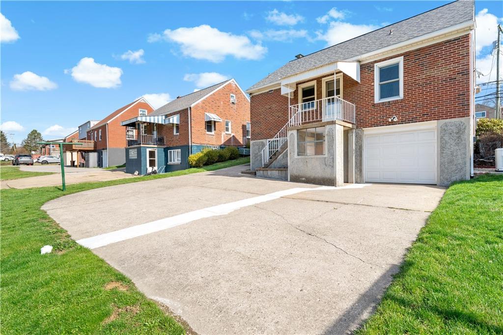 220 McClelland Road Canonsburg, PA 15317 - Photo 27 of 38 a front view of a house with a yard