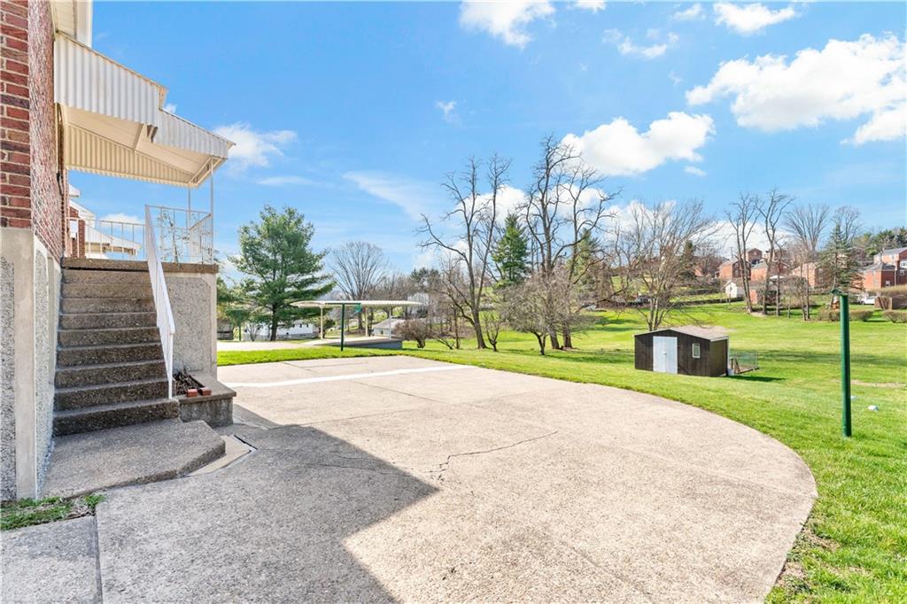 220 McClelland Road Canonsburg, PA 15317 - Photo 28 of 38 a view of a swimming pool with a yard and plants