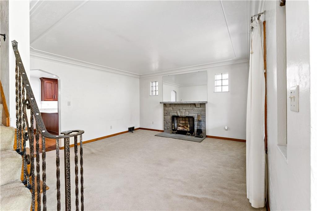220 McClelland Road Canonsburg, PA 15317 - Photo 3 of 38 a view of an empty room with fireplace and a window