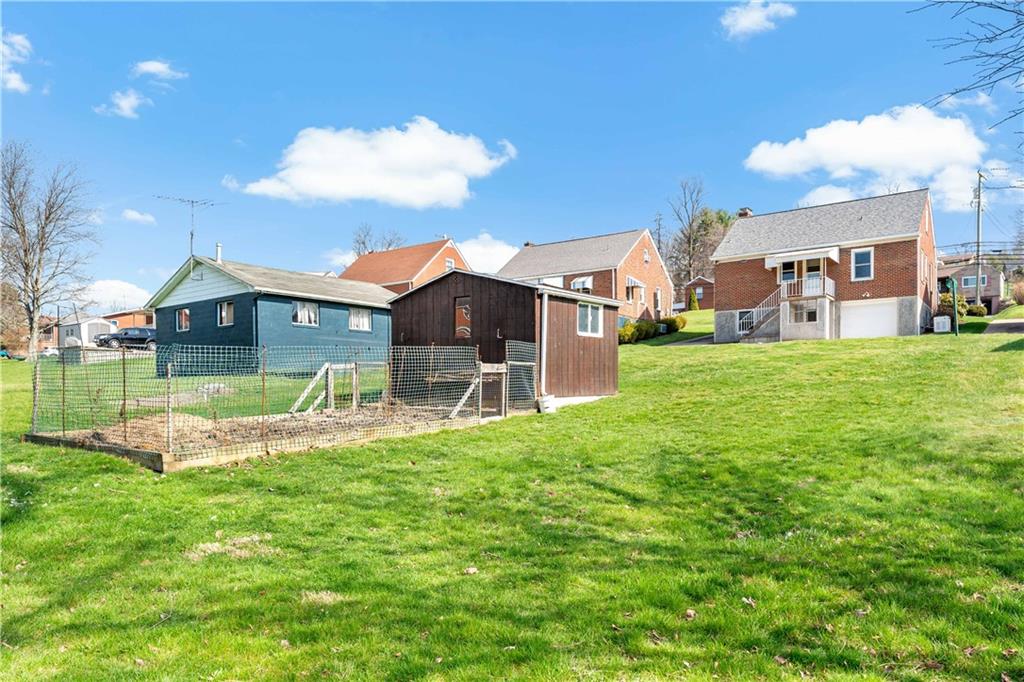 220 McClelland Road Canonsburg, PA 15317 - Photo 31 of 38 a view of a house with a big yard and a large tree