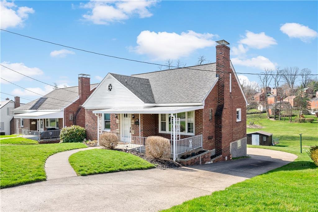220 McClelland Road Canonsburg, PA 15317 - Photo 32 of 38 a front view of a house with garden