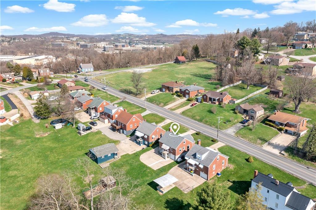 220 McClelland Road Canonsburg, PA 15317 - Photo 35 of 38 an aerial view of a city with lots of residential buildings ocean and mountain view in back
