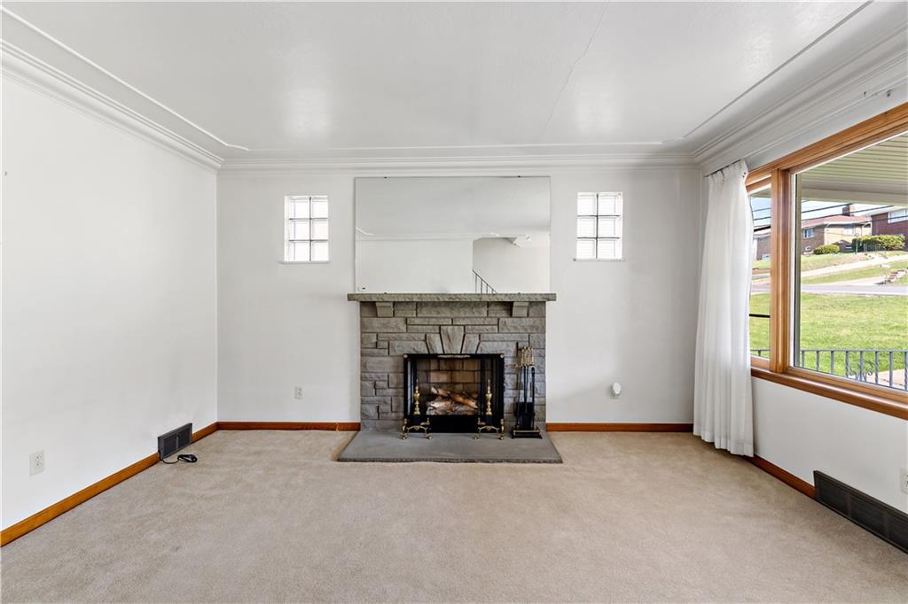 220 McClelland Road Canonsburg, PA 15317 - Photo 4 of 38 a living room with furniture and a fireplace