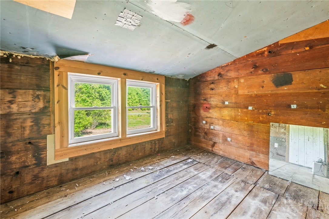657 Lawrence Greene Road Deep Gap, NC 28618 - Photo 25 of 25 a view of an empty room and window