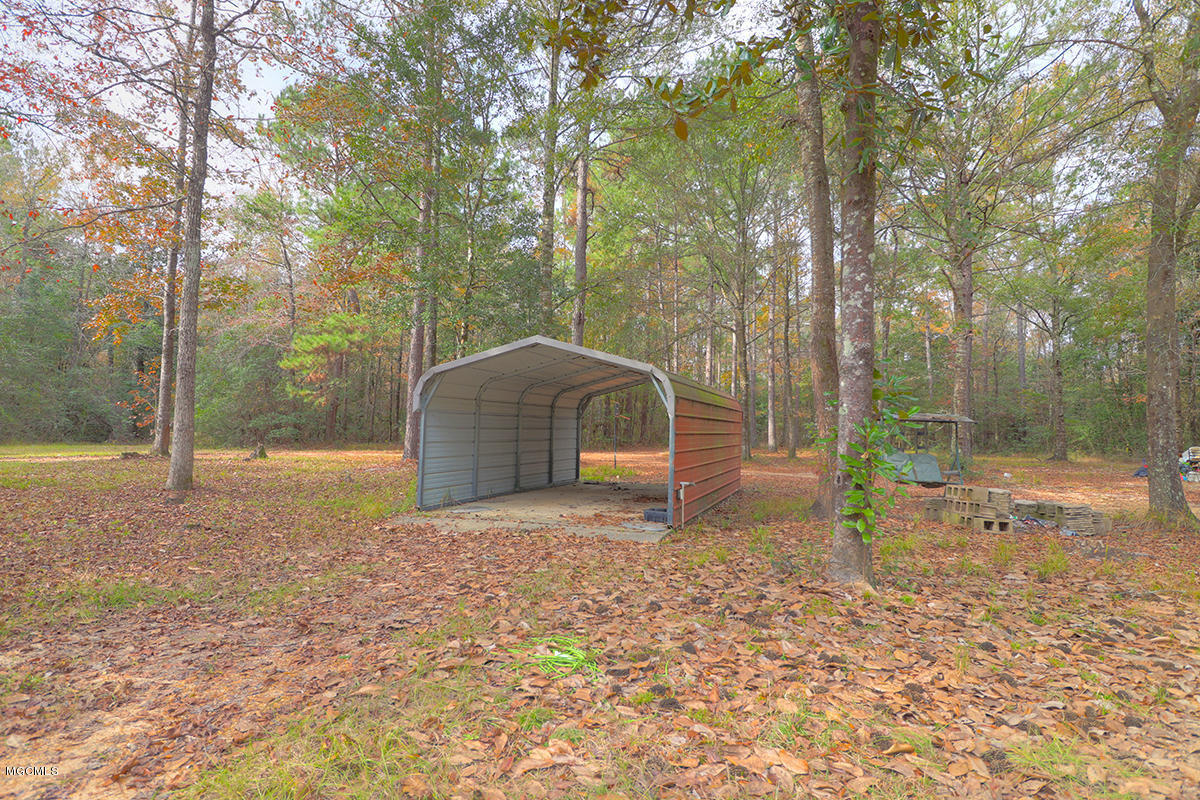 40 Price Road Perkinston, MS 39573 - Photo 3 of 7 Covered carport