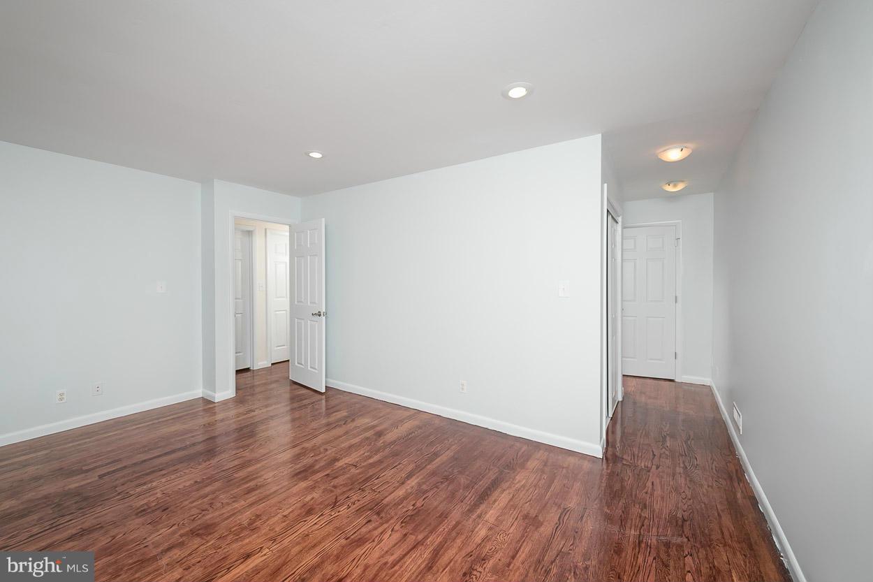 9120 Bengal Road Randallstown, MD 21133 - Photo 13 of 30 a view of an empty room with wooden floor
