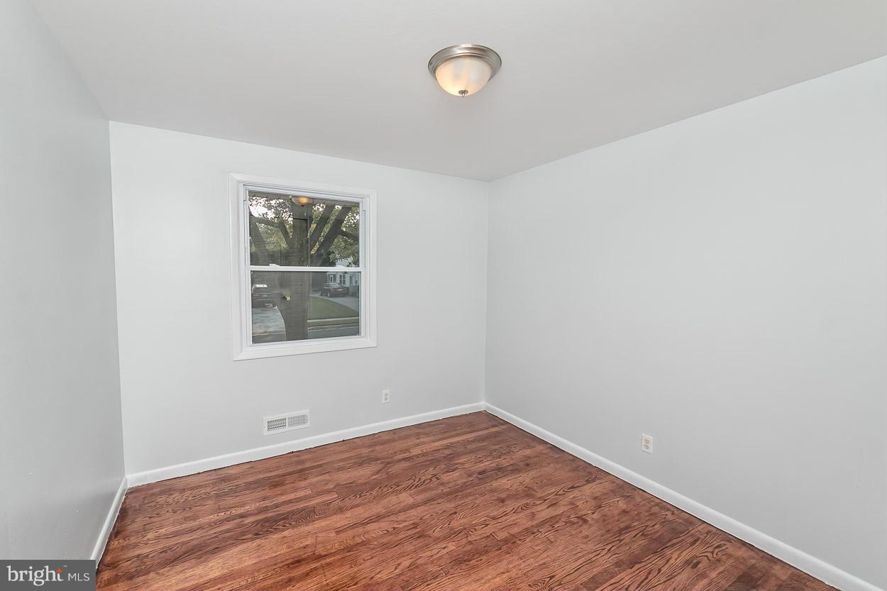 9120 Bengal Road Randallstown, MD 21133 - Photo 17 of 30 an empty room with a window and closet