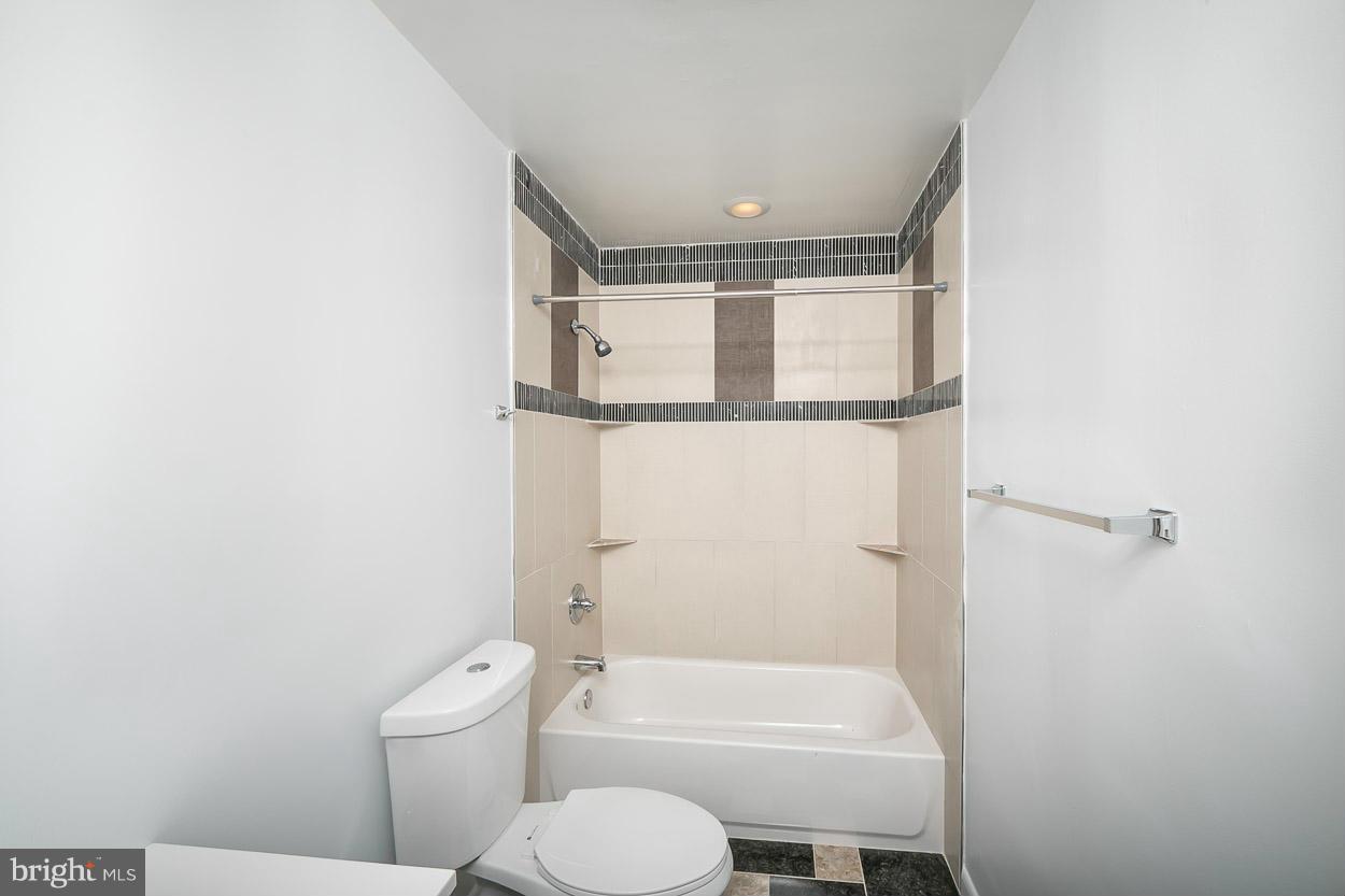 9120 Bengal Road Randallstown, MD 21133 - Photo 19 of 30 a bathroom with a toilet and a shower