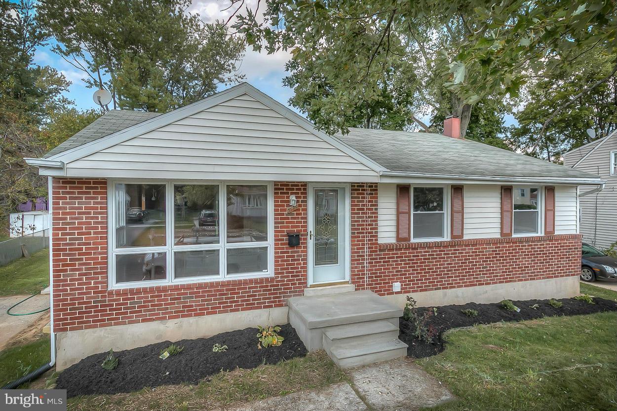 9120 Bengal Road Randallstown, MD 21133 - Photo 3 of 30 a front view of a house with a yard