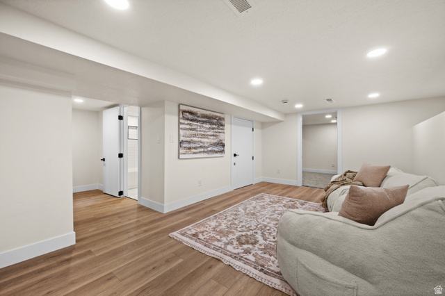 189 West Center Street Midvale, UT 84047 - Photo 30 of 64 Spacious interior with wood-finish flooring, white baseboards, and recessed lighting