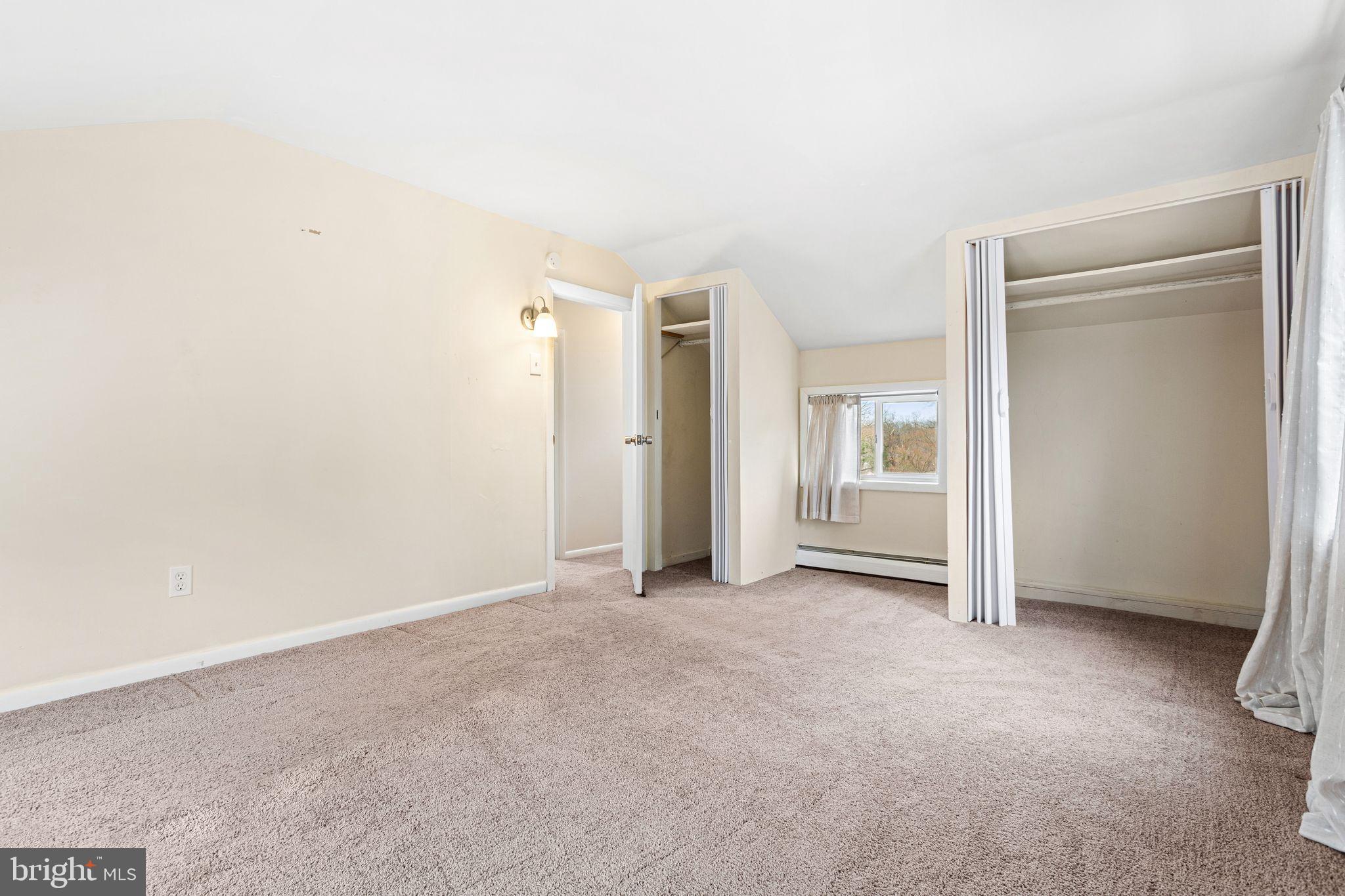 224 South Pennell Road Media, PA 19063 - Photo 16 of 27 an empty room with closet and a bathroom