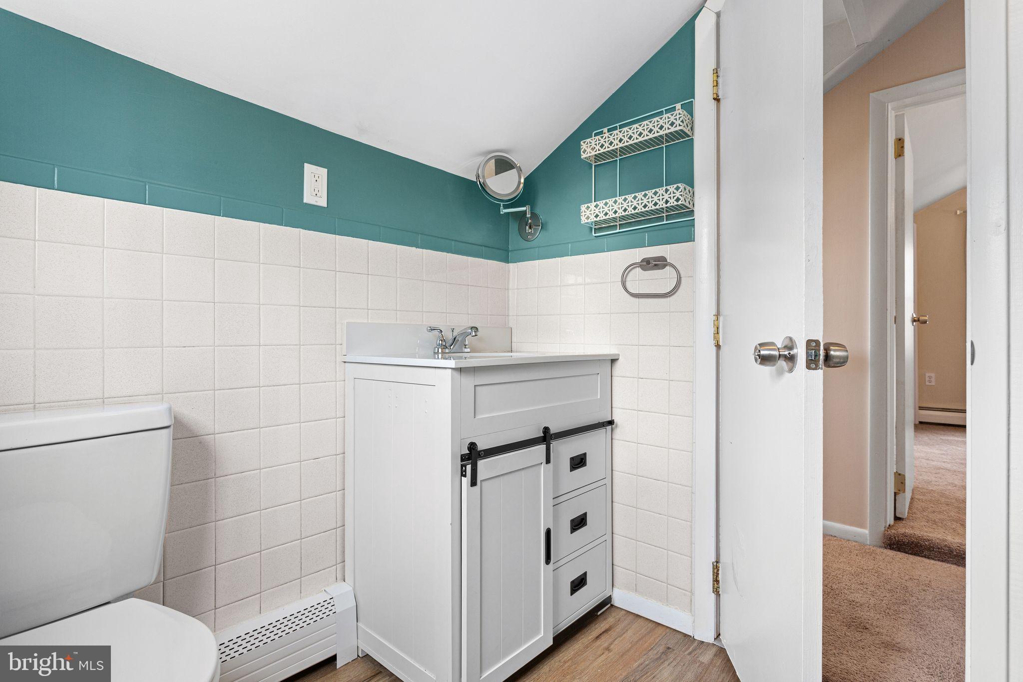 224 South Pennell Road Media, PA 19063 - Photo 17 of 27 a bathroom with a toilet and a sink