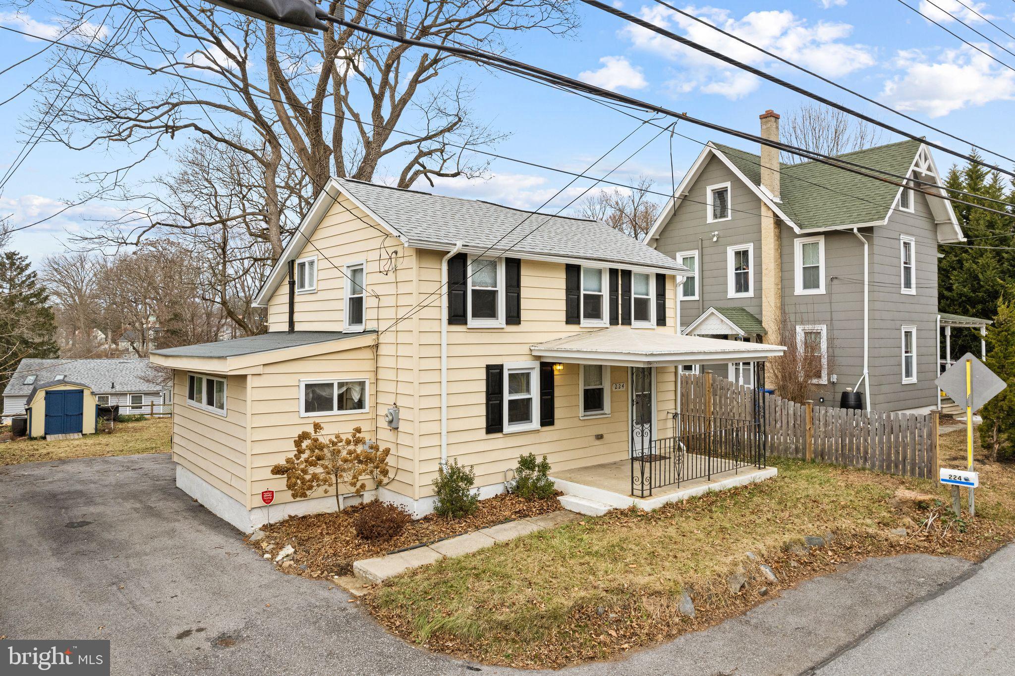 224 South Pennell Road Media, PA 19063 - Photo 25 of 27 a front view of a house with a yard