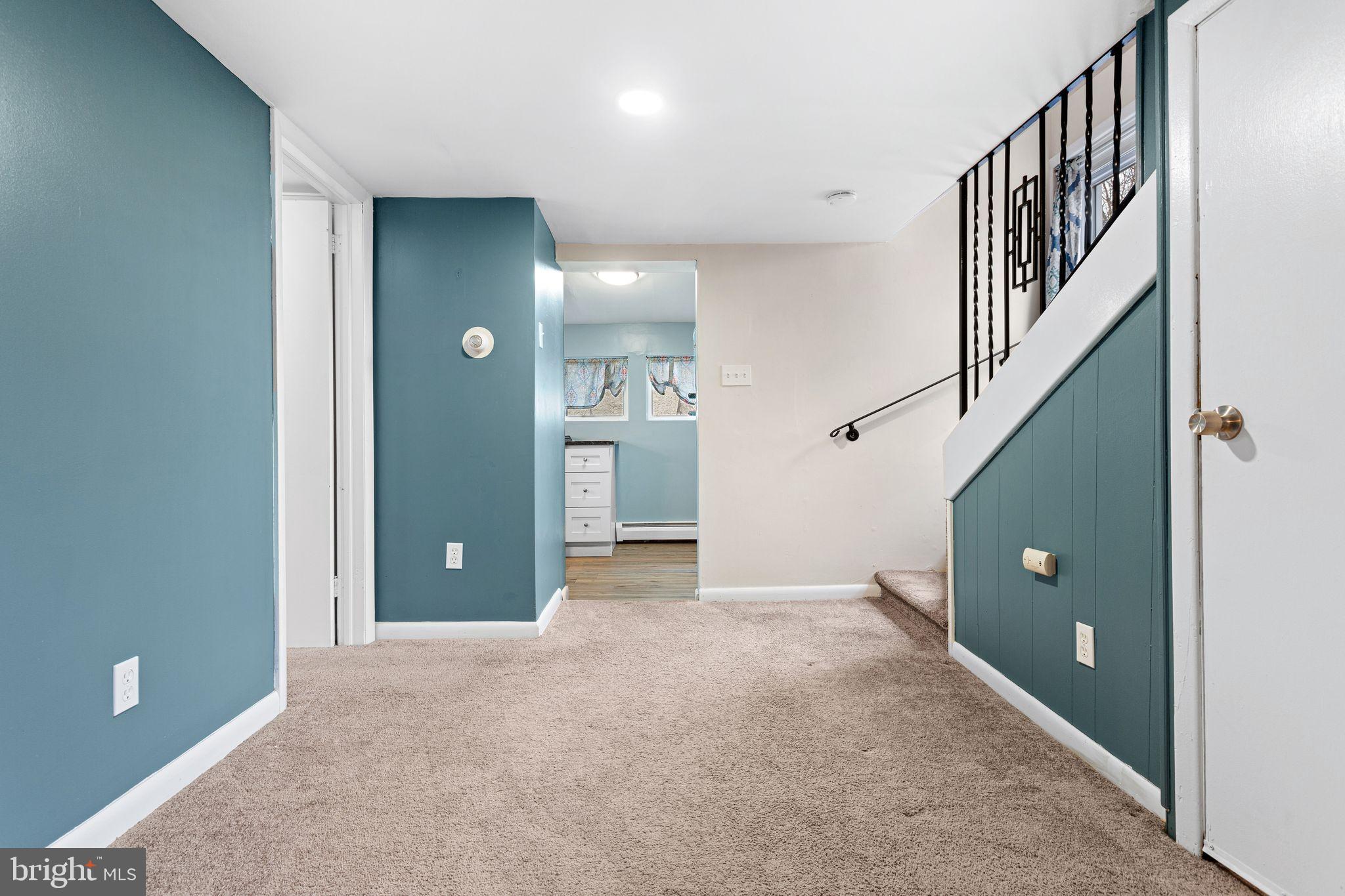 224 South Pennell Road Media, PA 19063 - Photo 5 of 27 a view of an empty room with stairs and wooden floor
