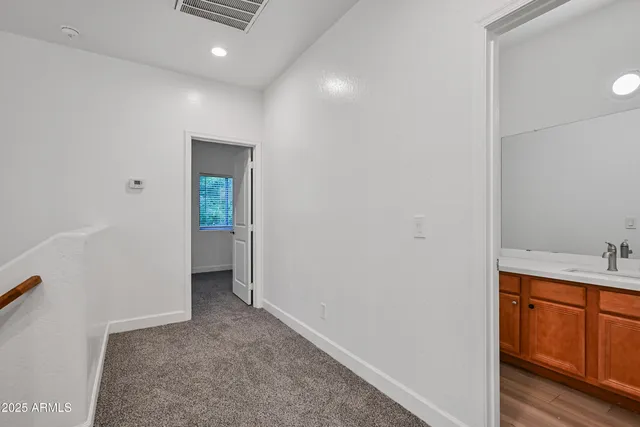 a view of hallway with washer and dryer