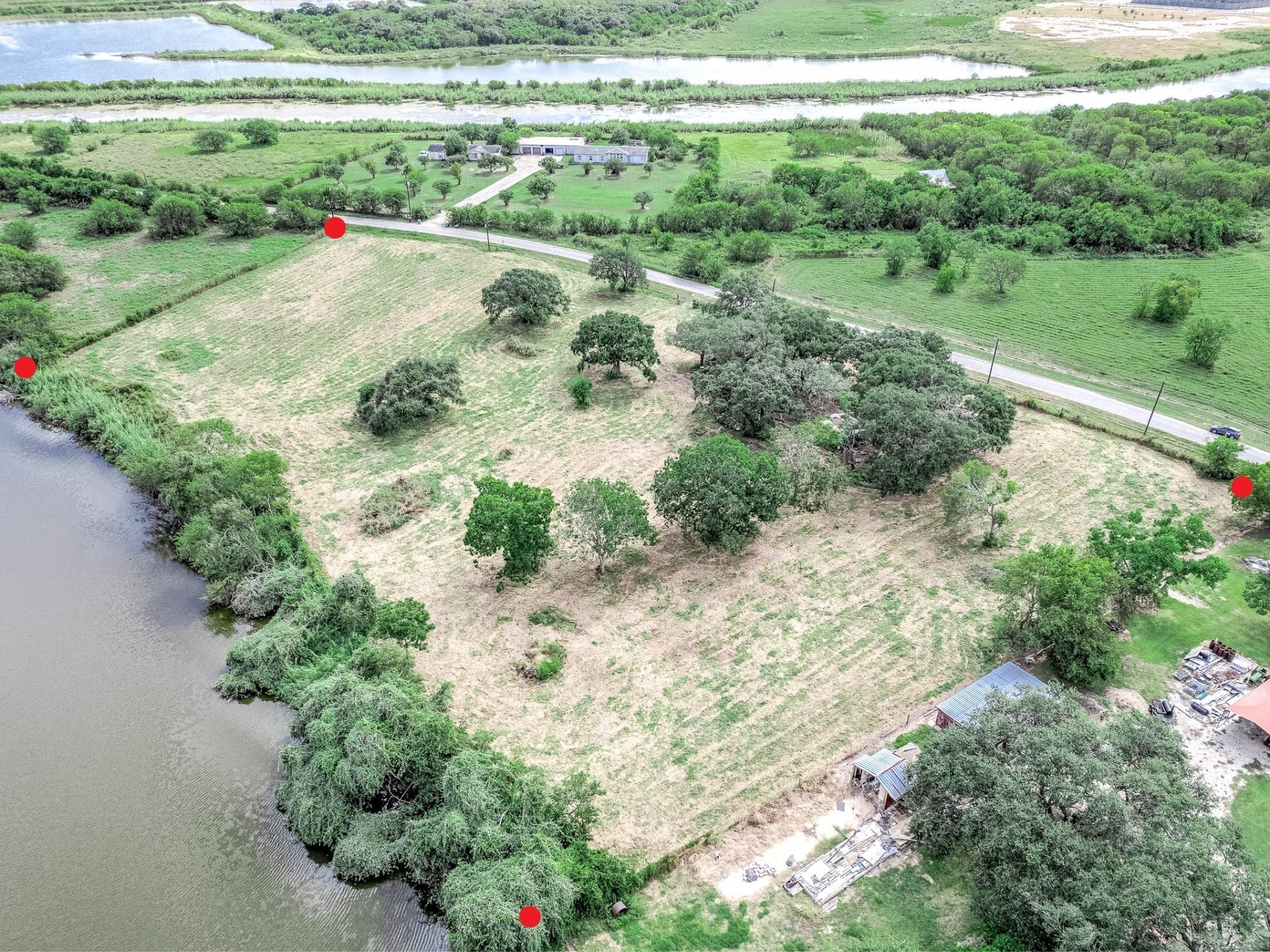 2230 Duncan Drive Freeport, TX 77541 - Photo 2 of 12 a view of a park with large trees