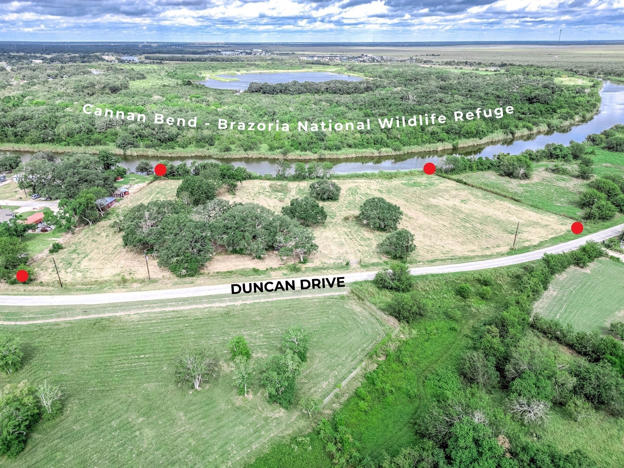 2230 Duncan Drive Freeport, TX 77541 - Photo 4 of 12 a view of a park with a bench and yard