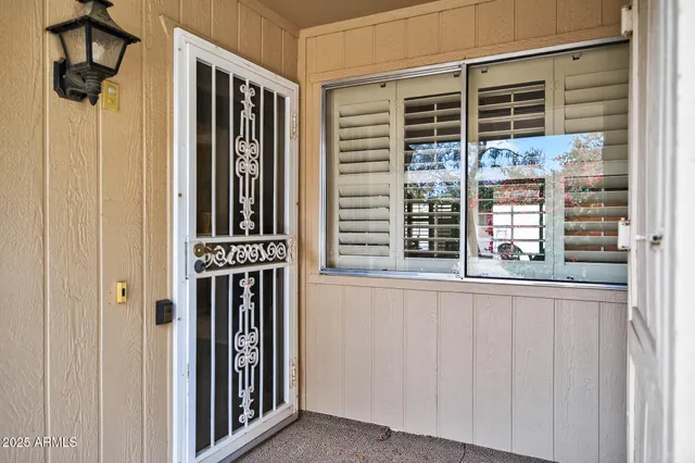 a view of a hallway with windows