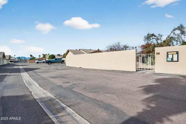 a view of a backyard of the house