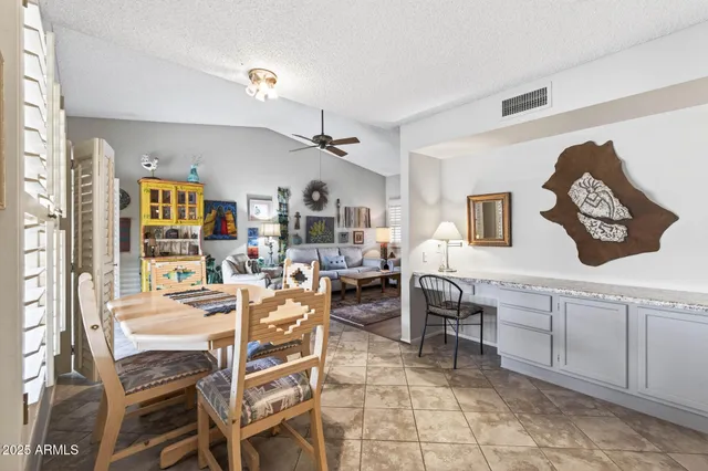 a view of a dining room with furniture