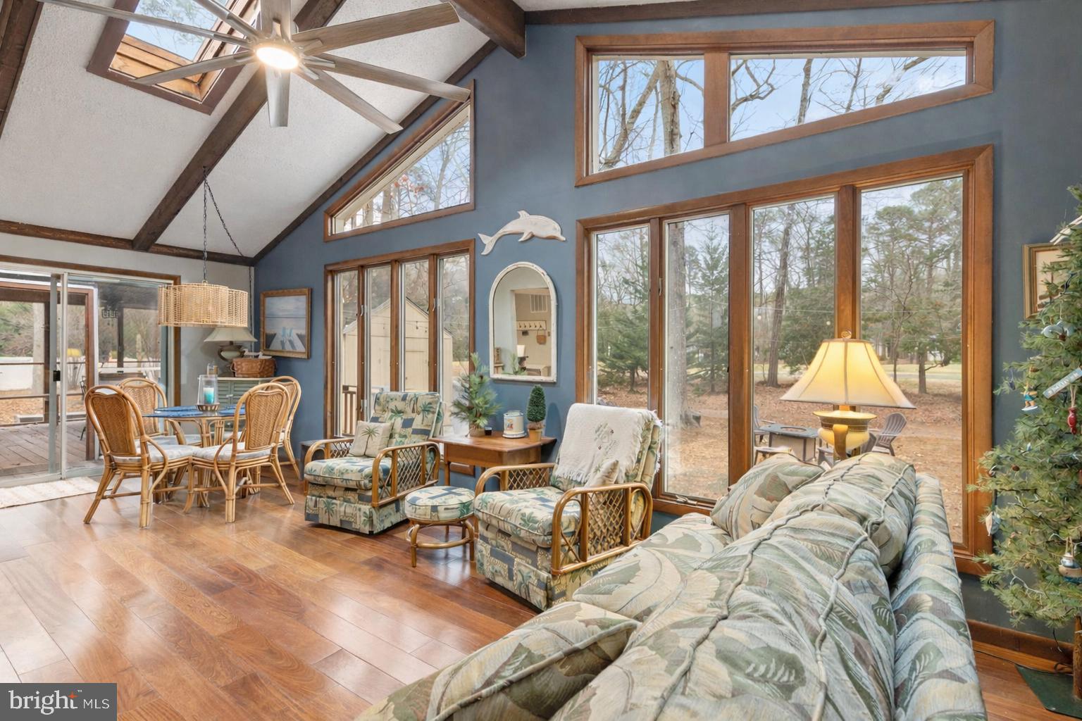 48 Battersea Road Ocean Pines, MD 21811 - Photo 13 of 46 a living room with furniture tv and large windows