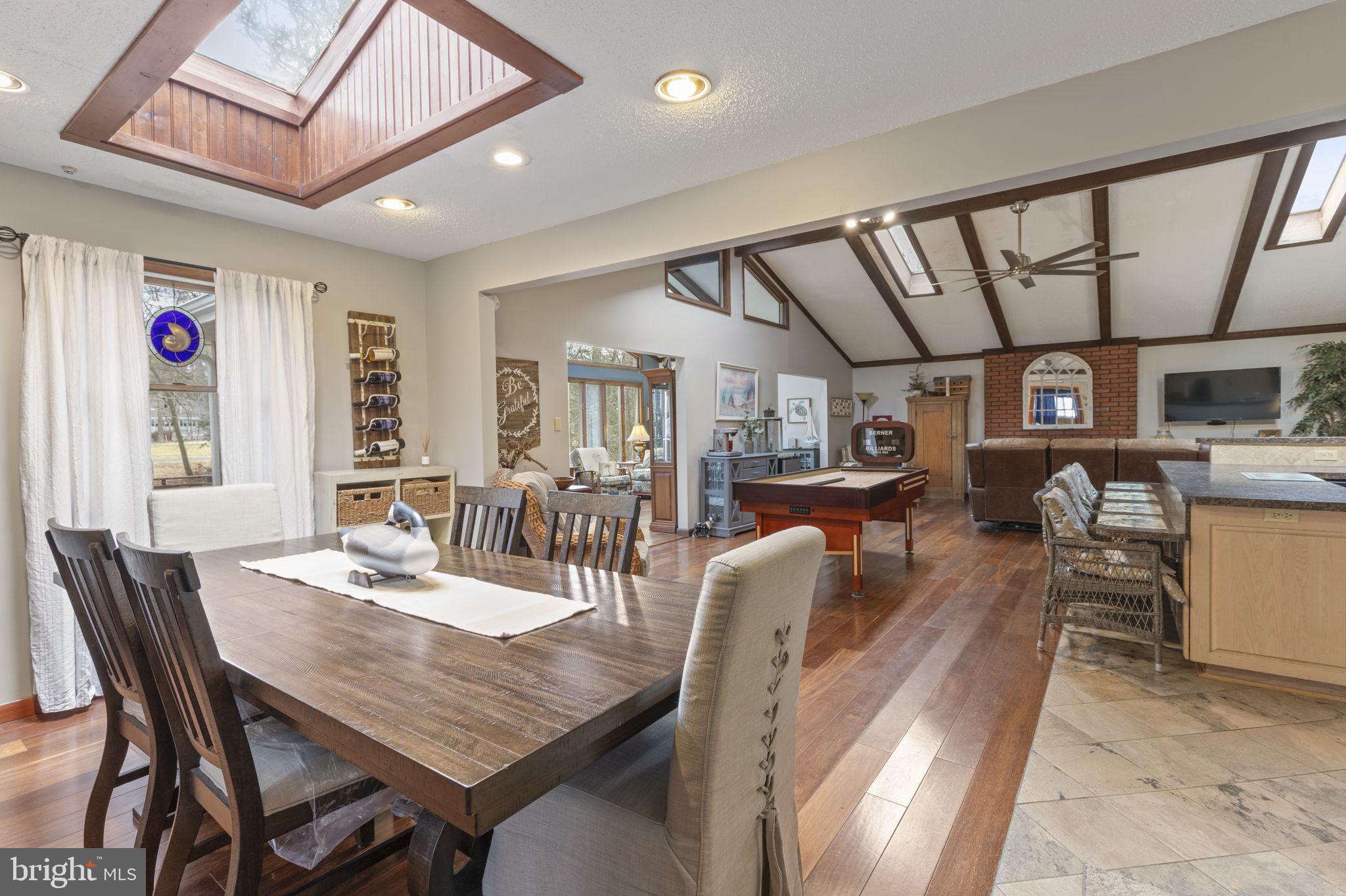 48 Battersea Road Ocean Pines, MD 21811 - Photo 16 of 46 a view of a dining room with furniture window and wooden floor