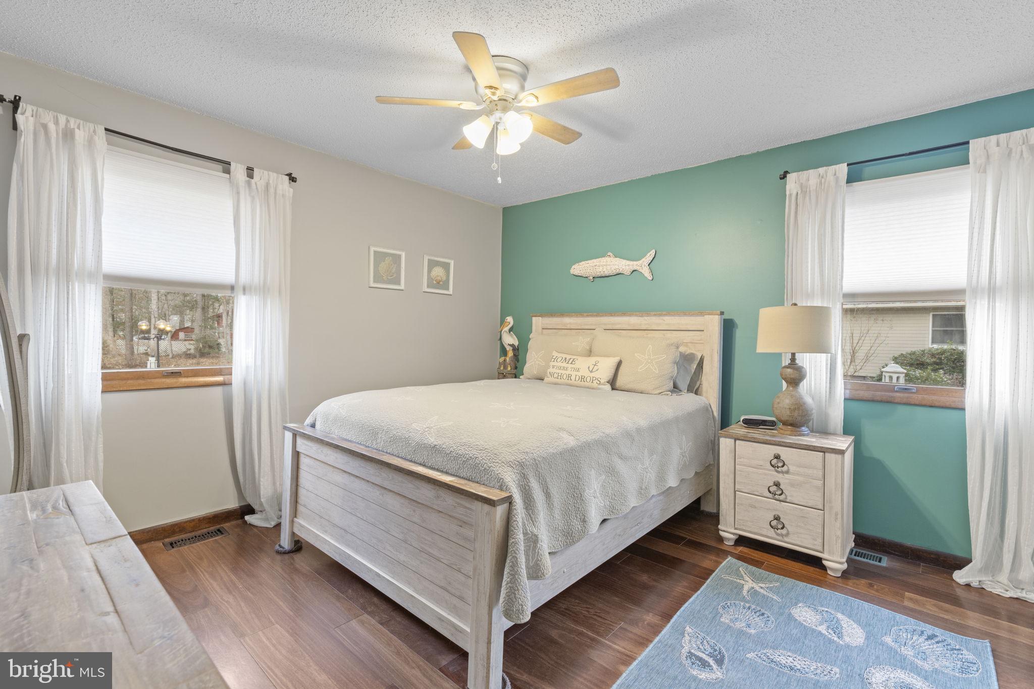 48 Battersea Road Ocean Pines, MD 21811 - Photo 17 of 46 a bedroom with a bed and a window