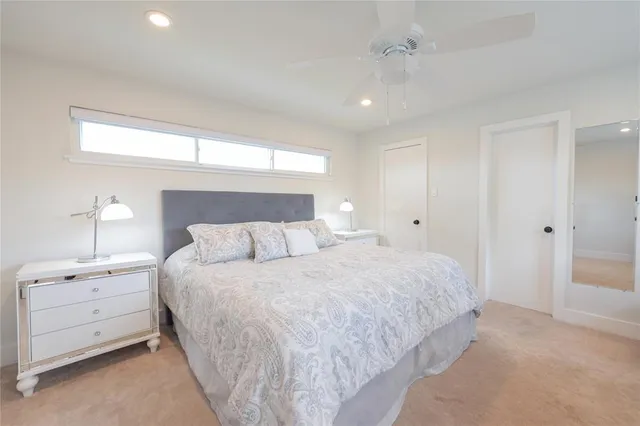 walk in closet with clothes