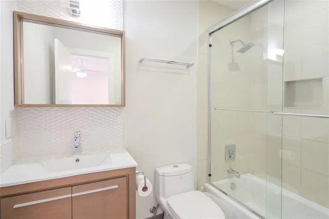 a living room with a couch and a flat screen tv