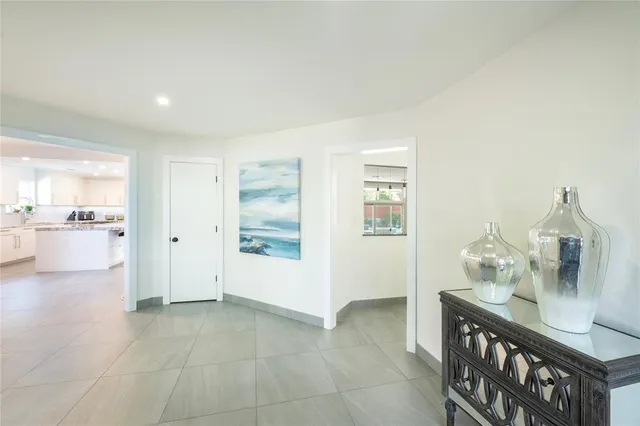 a view of a kitchen and dining room