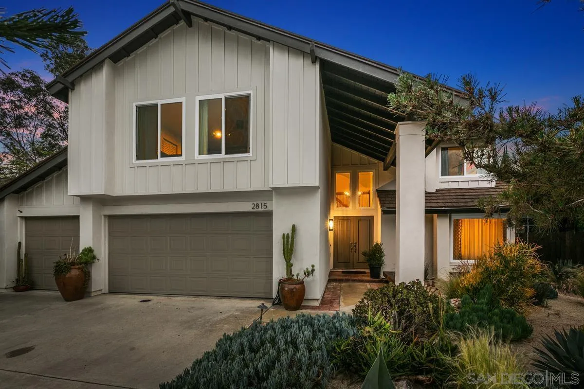 2815 Jacaranda Avenue Carlsbad, CA 92009 - Photo 1 of 30 a front view of a house with a yard