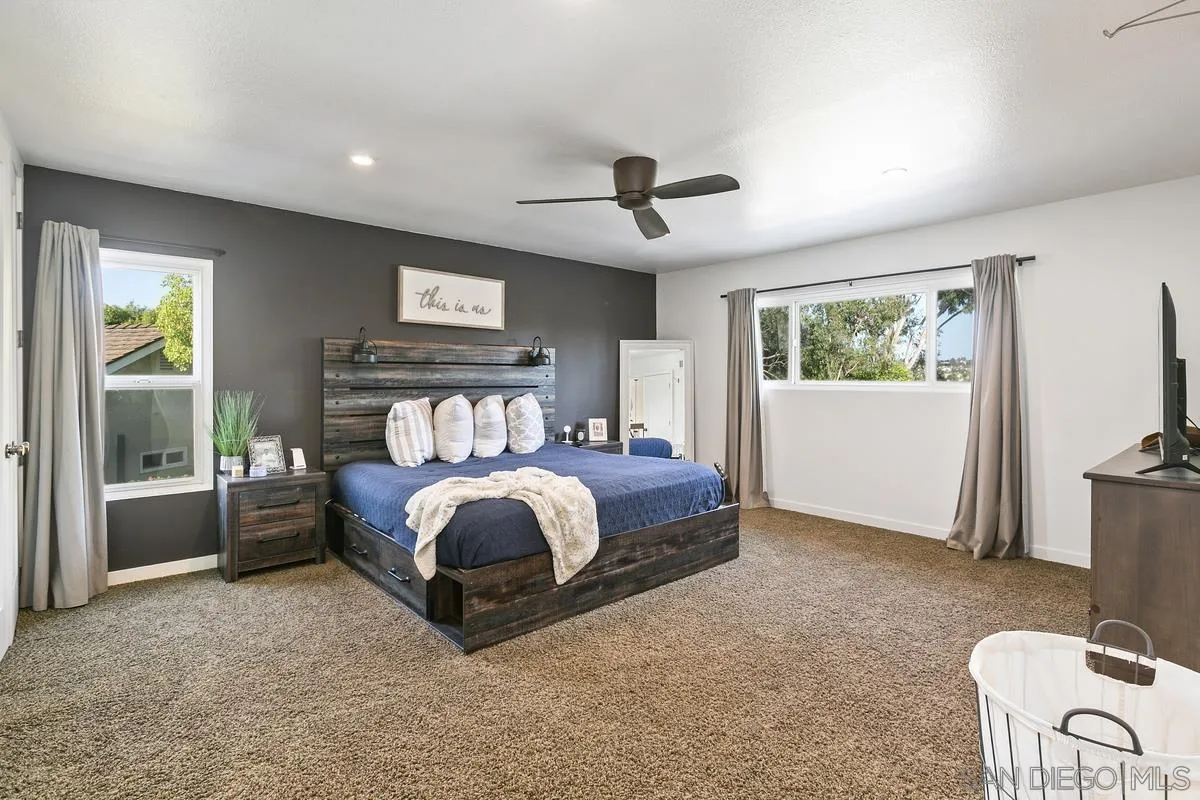 2815 Jacaranda Avenue Carlsbad, CA 92009 - Photo 19 of 30 a bed room with a bed and a window