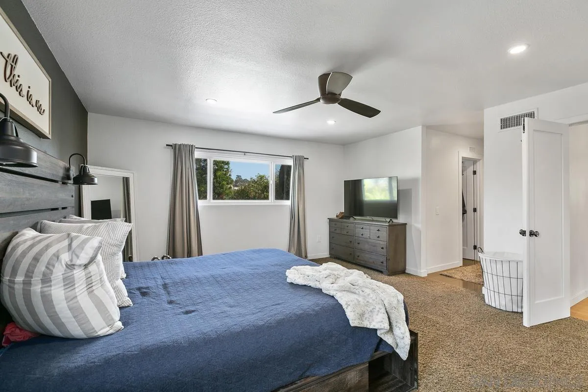 2815 Jacaranda Avenue Carlsbad, CA 92009 - Photo 20 of 30 a bedroom with a bed and a television