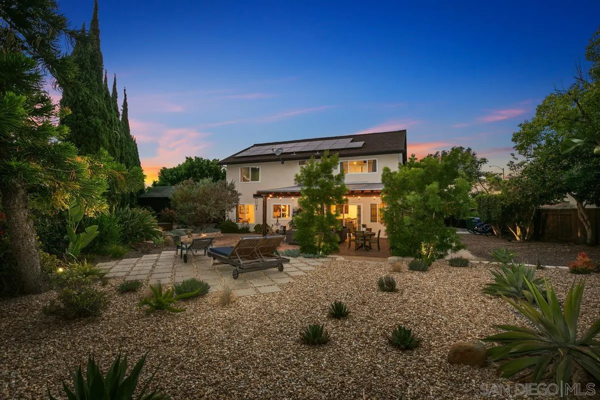 2815 Jacaranda Avenue Carlsbad, CA 92009 - Photo 5 of 30 a view of a chair and table in the backyard
