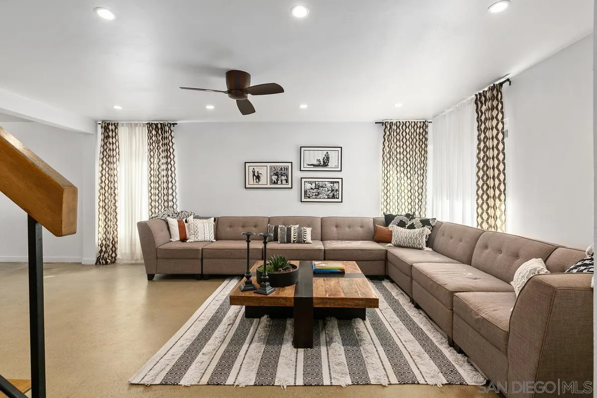 2815 Jacaranda Avenue Carlsbad, CA 92009 - Photo 9 of 30 a living room with furniture and a flat screen tv