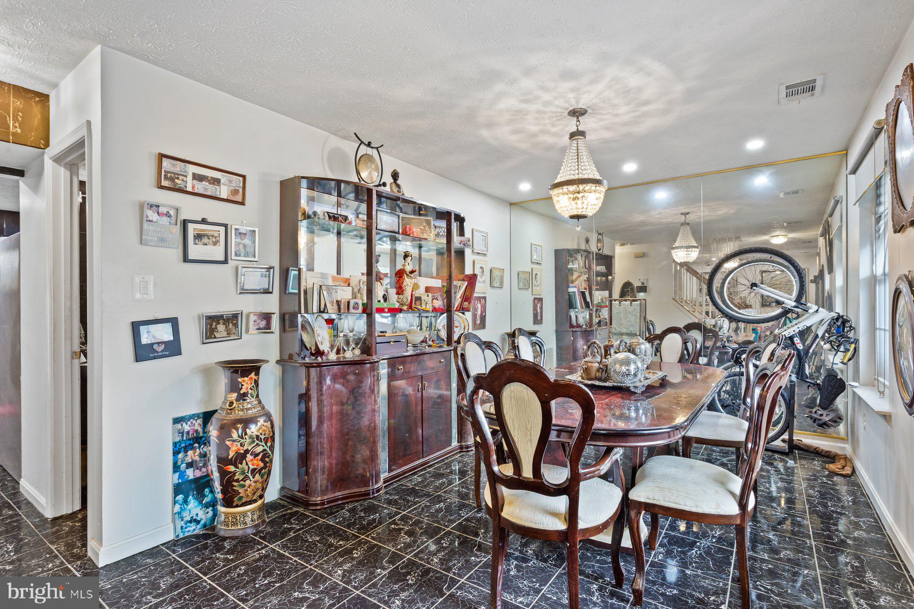 2448 Shellcove Court Waldorf, MD 20601 - Photo 12 of 38 a view of a dining room with furniture and chandelier
