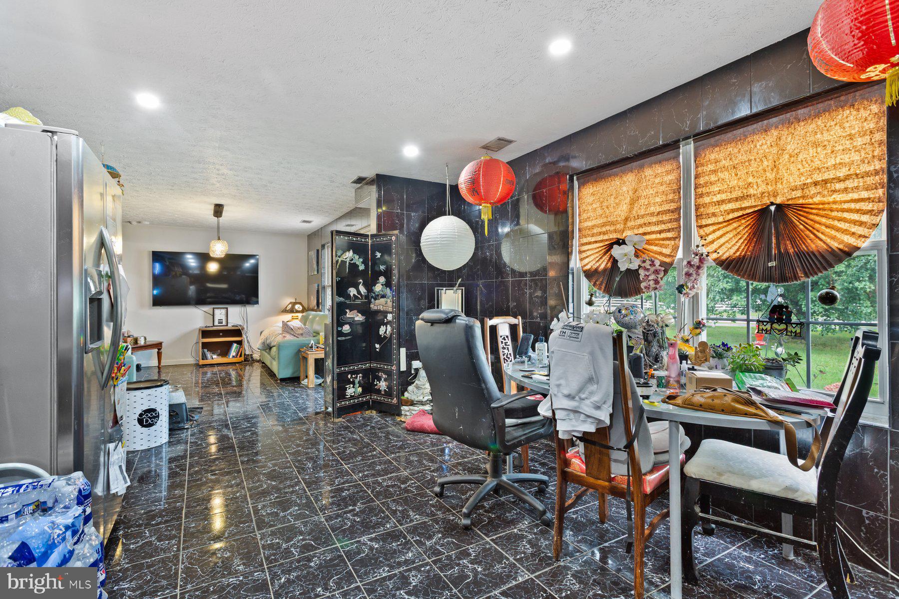 2448 Shellcove Court Waldorf, MD 20601 - Photo 16 of 38 a view of a dining room with furniture window and outside view