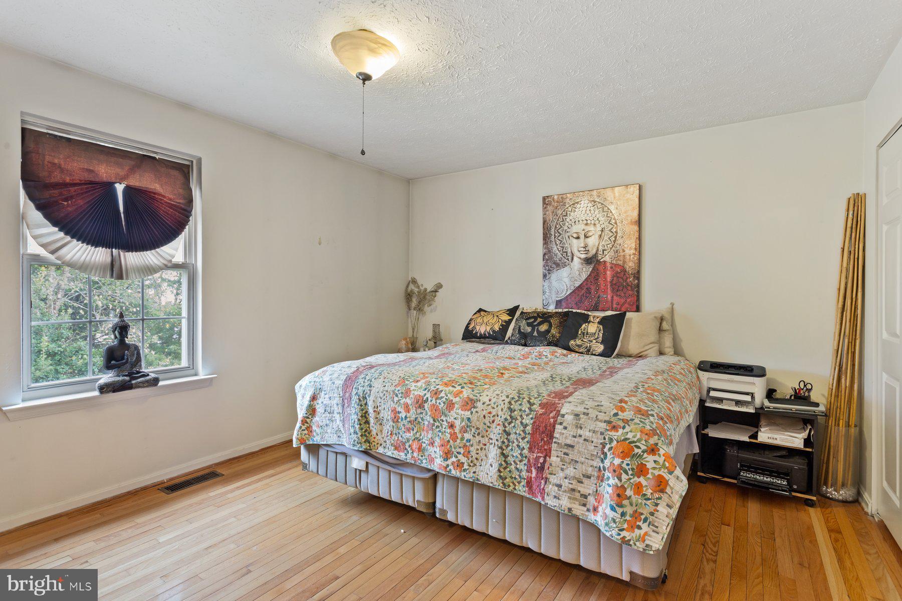 2448 Shellcove Court Waldorf, MD 20601 - Photo 25 of 38 a bedroom with a bed and a window