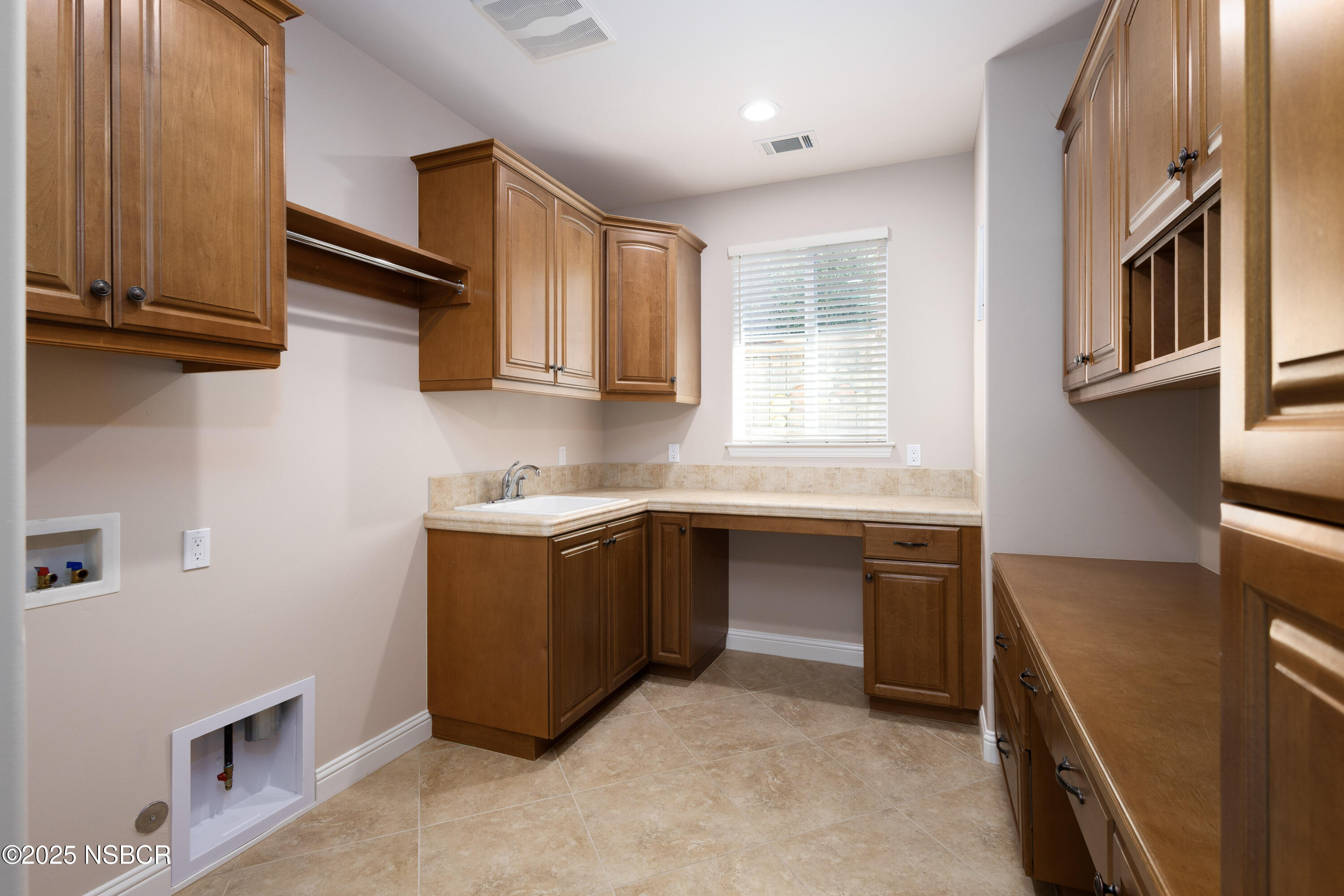 775 Mahogany Street Santa Maria, CA 93455 - Photo 13 of 34 a kitchen with stainless steel appliances granite countertop a sink stove and cabinets