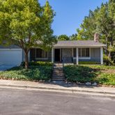 front view of house with a small yard