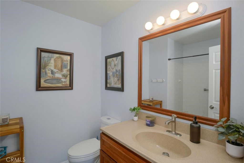 10424 Cartilla Court Rancho Cucamonga, CA 91737 - Photo 21 of 36 a bathroom with a sink vanity and toilet
