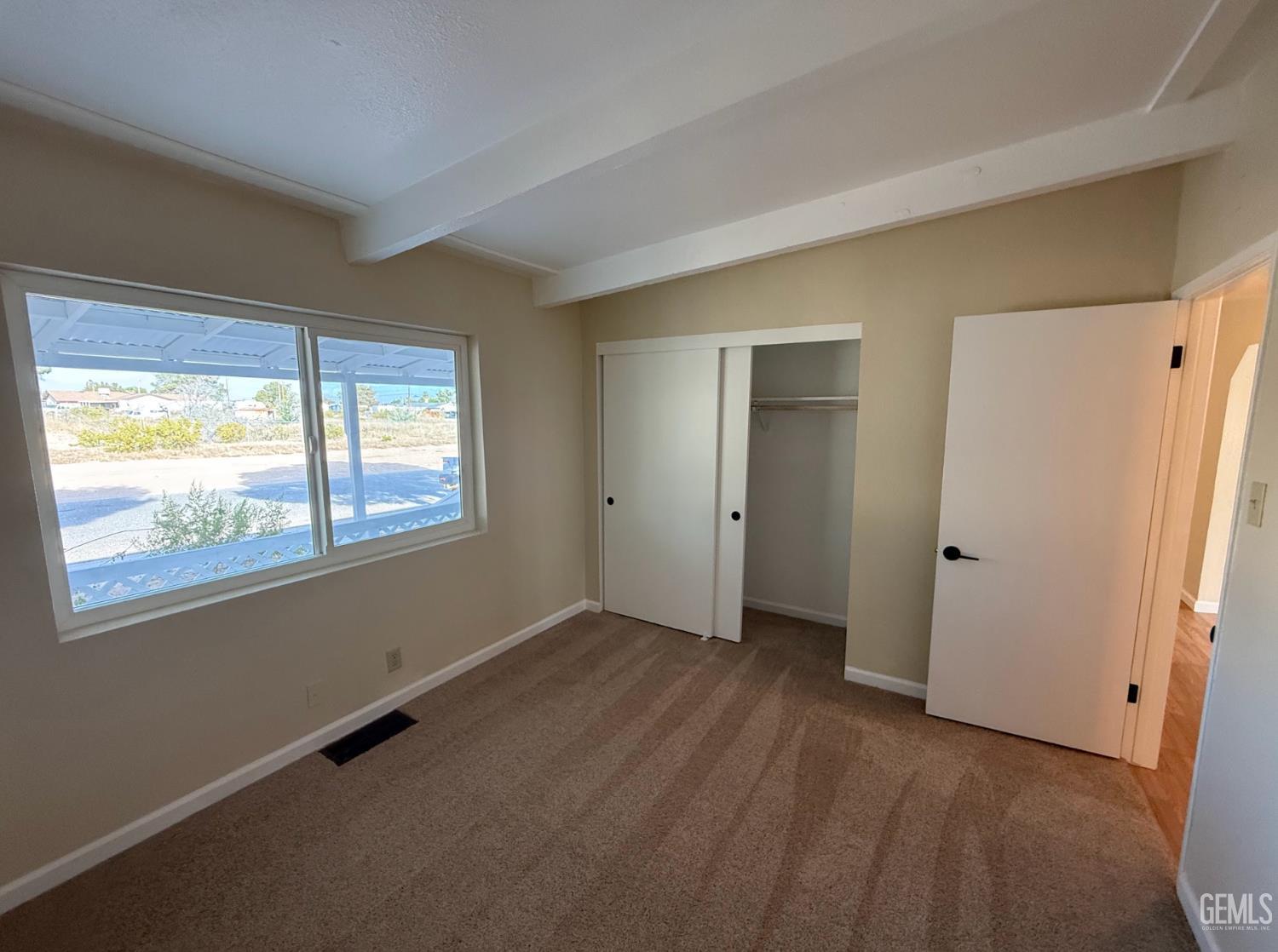 Undisclosed Address Ridgecrest, CA 93555 - Photo 31 of 45 a view of an empty room with a window