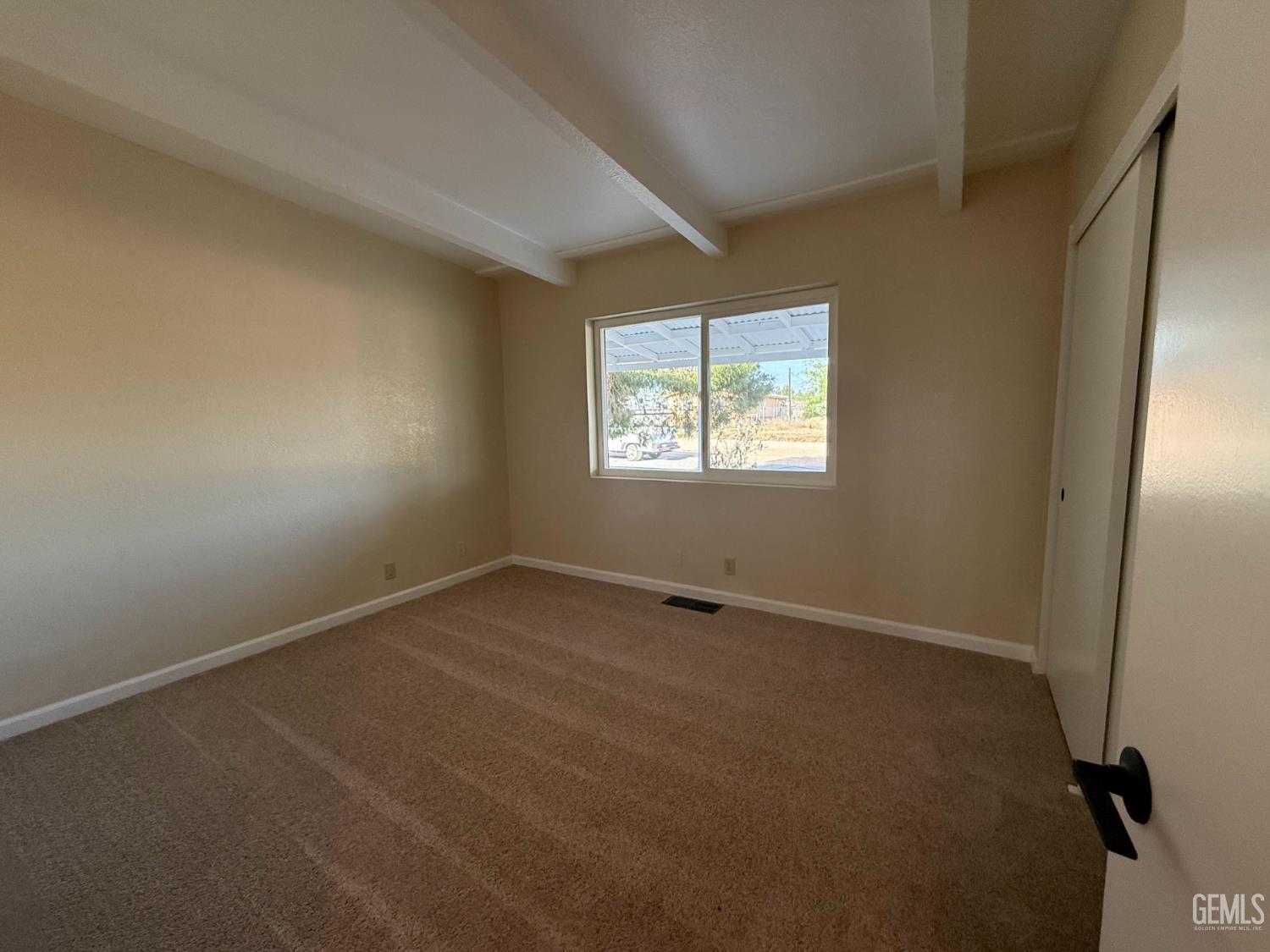 Undisclosed Address Ridgecrest, CA 93555 - Photo 32 of 45 an empty room with a window