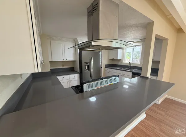 wooden floor in a hall with an entryway