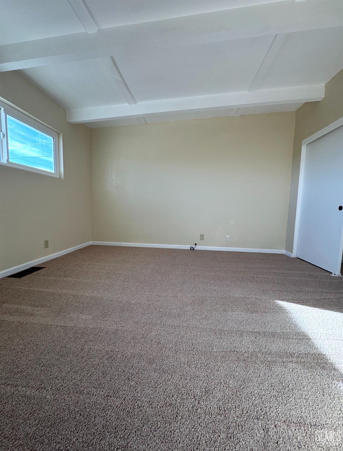 Undisclosed Address Ridgecrest, CA 93555 - Photo 8 of 45 a view of an empty room with a window